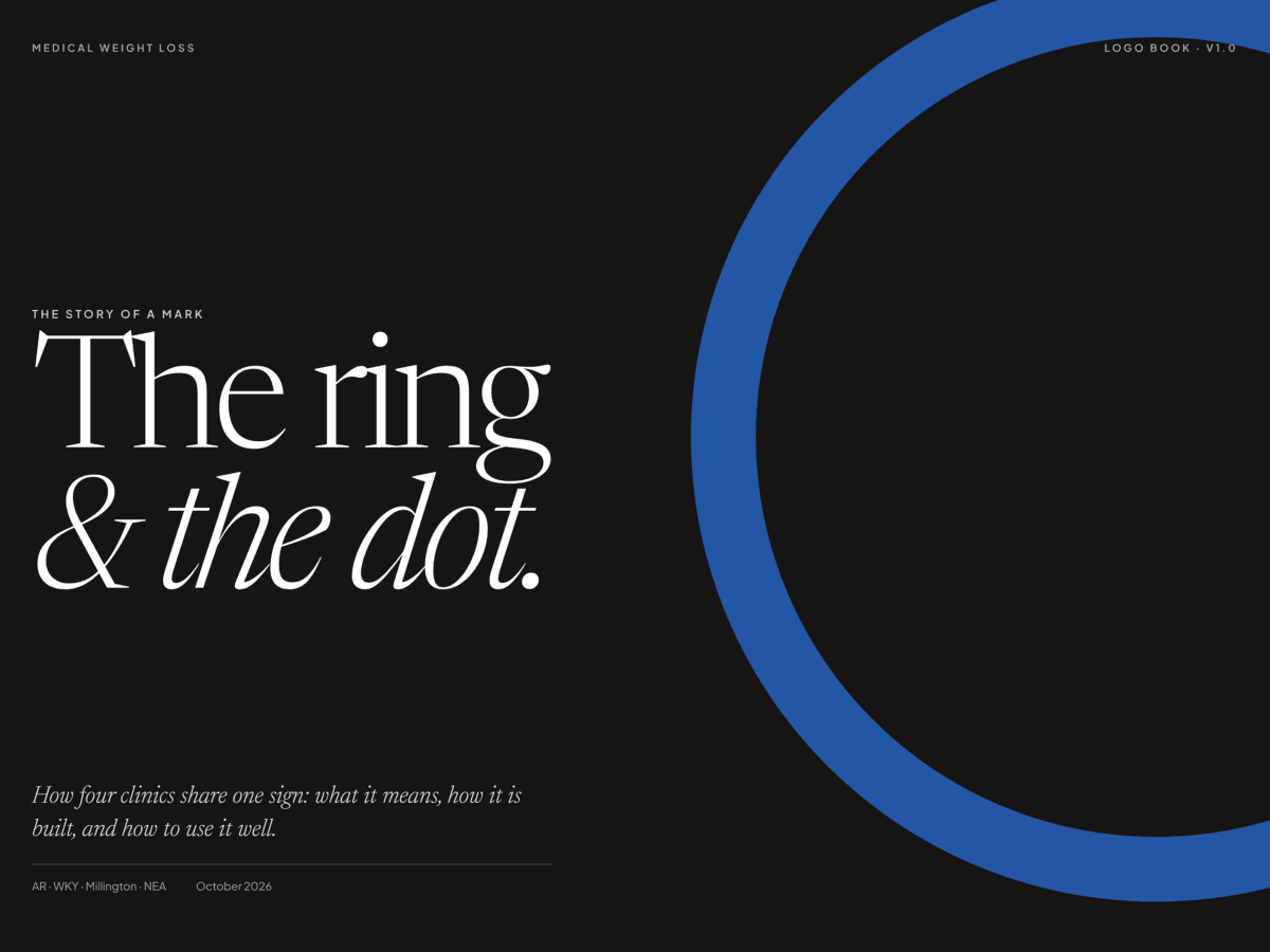 Logo book cover: 'The ring & the dot' in white serif type beside a large open blue ring on black